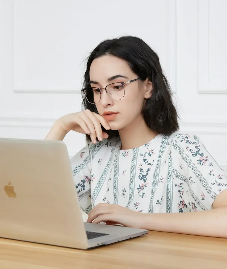 IB student studying with a laptop
