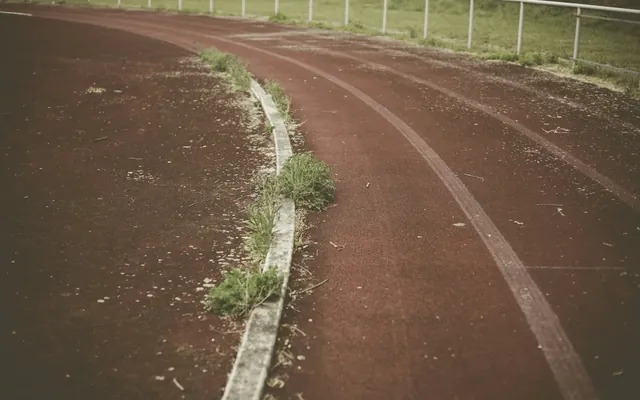 Running track symbolizing steady progress